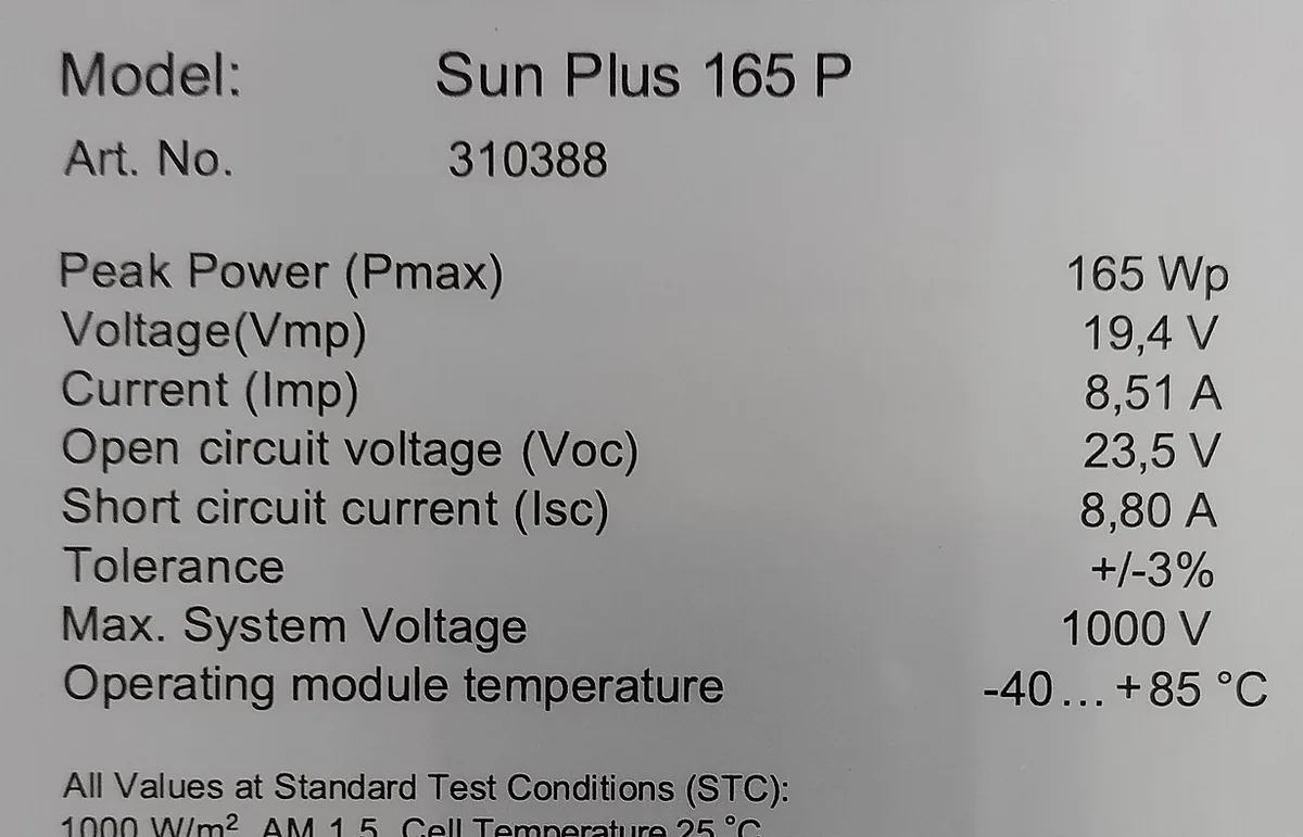 Close-up of a solar module rating plate listing peak power, Vmp, Imp, Voc, Isc, tolerance and system voltage
